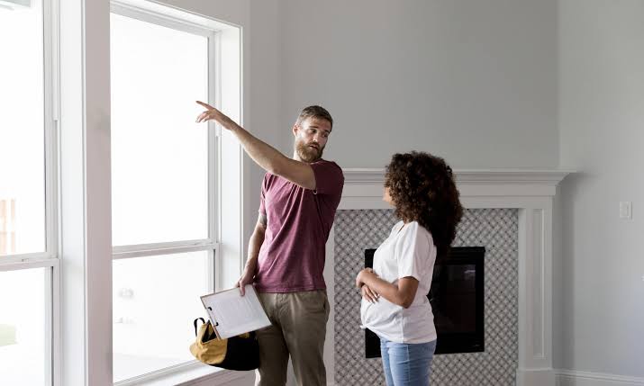 Real Estate in Lagos Nigeria: 10 Things Every Buyer Should Know 3 Buyer inspecting a property in Lagos before purchase.